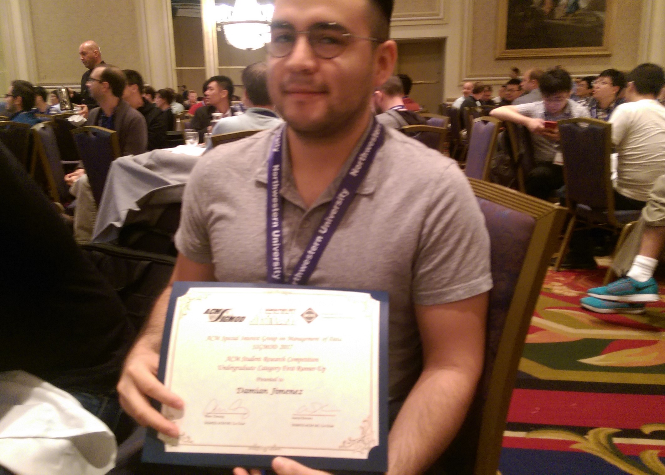 Damian receiving undergraduate research award at SIGMOD17 in Chicago